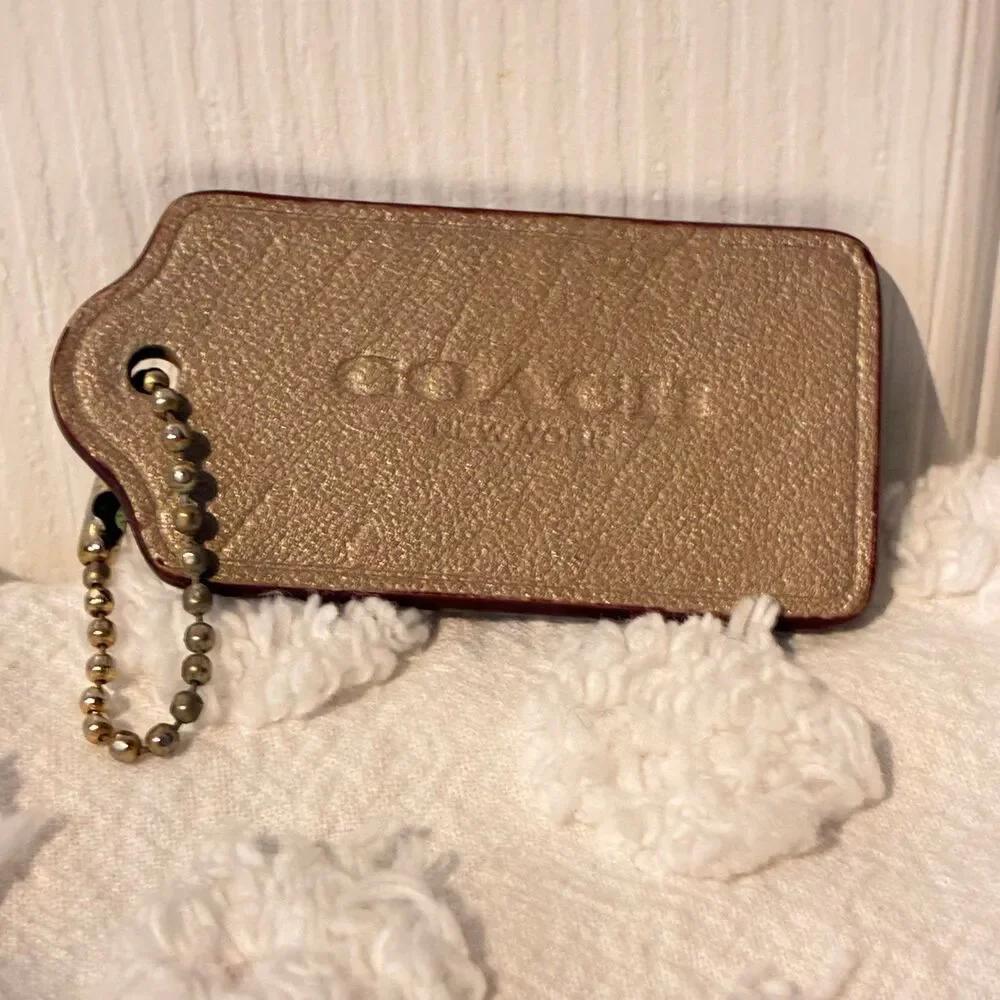 Coach Champagne Color Bag Charm